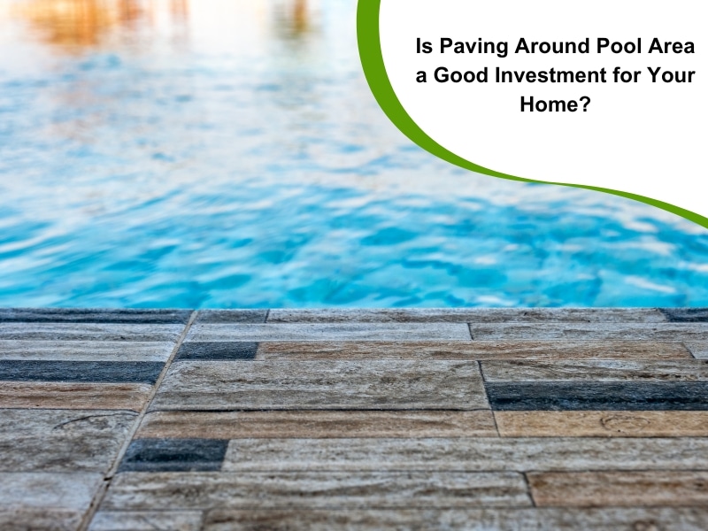 A close-up of paving around a pool area, showing textured tiles leading to blue water.